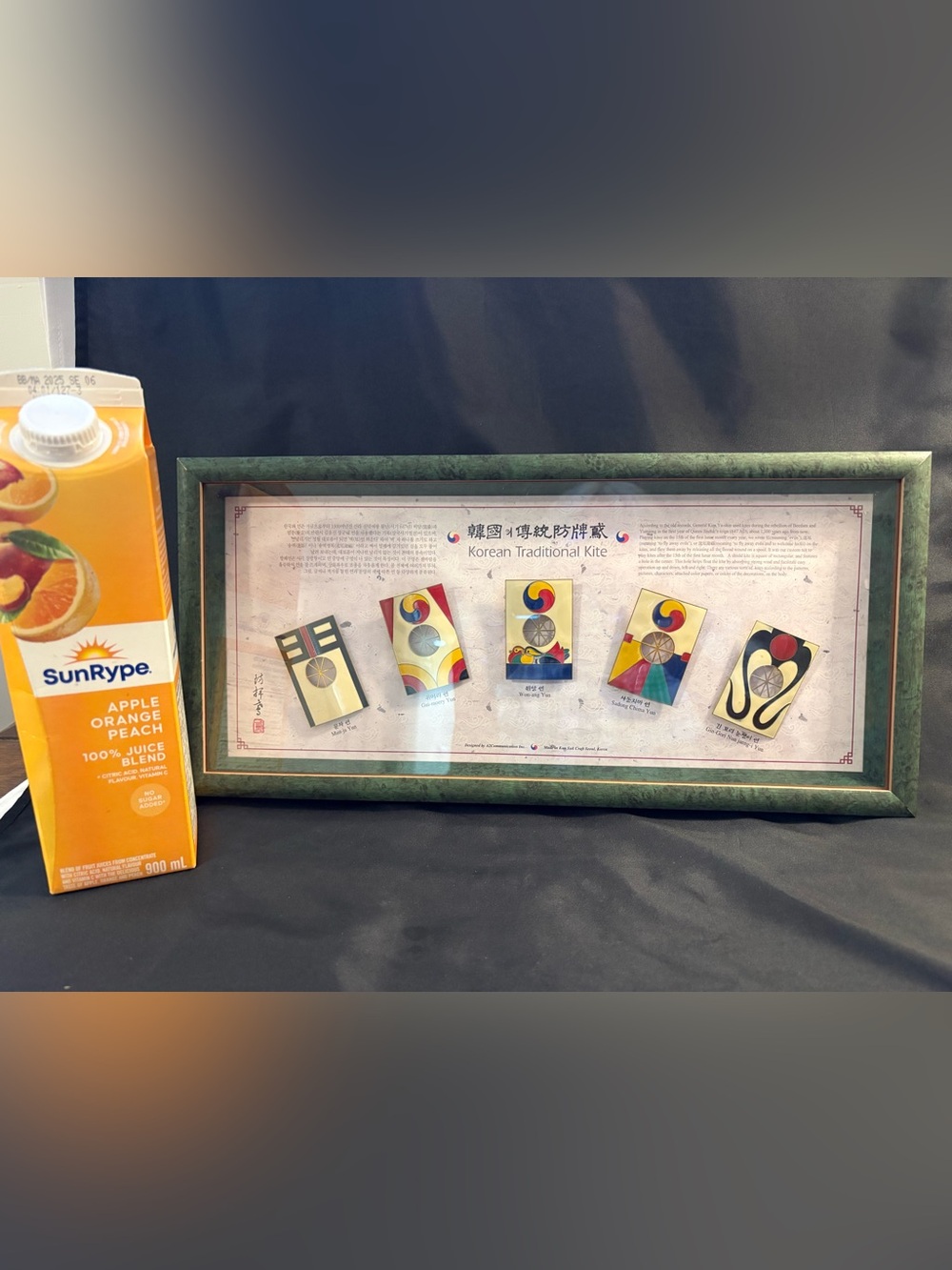 Shadowbox containing five traditional Korean kite replicas